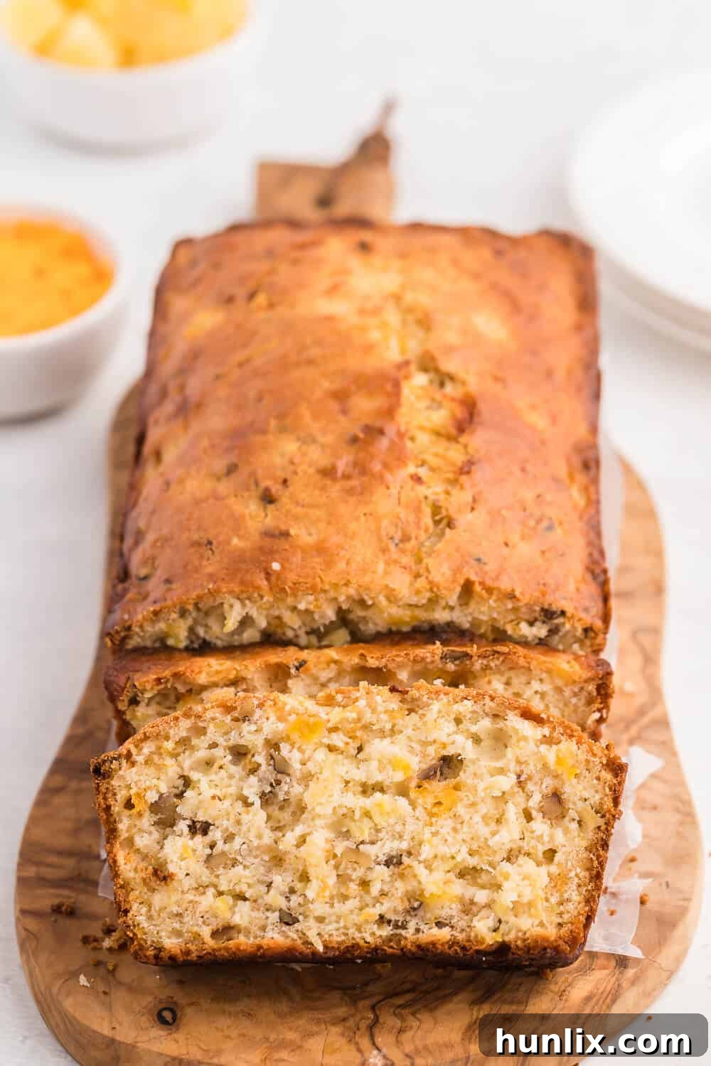 Close-up of Pineapple Cheese Bread with visible pineapple and cheese
