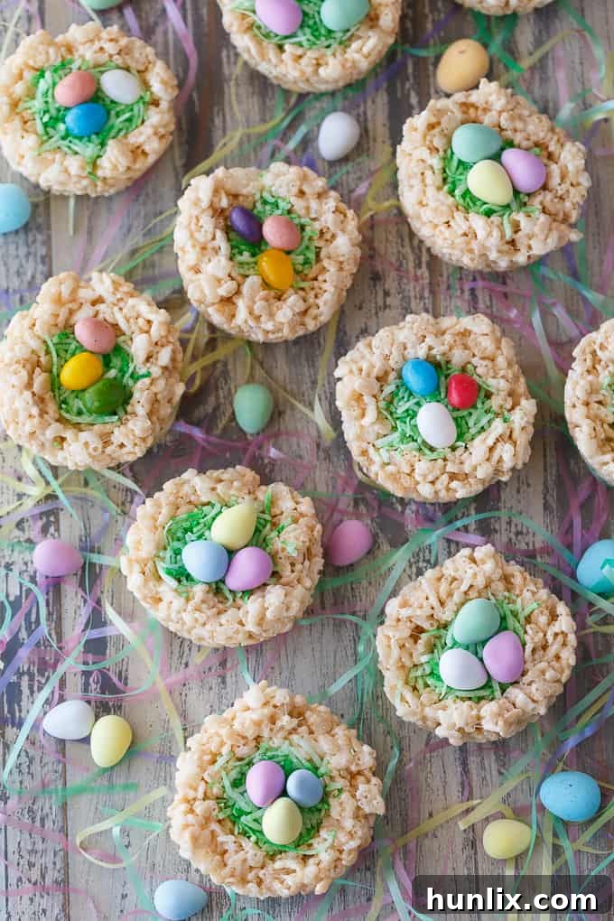 Krispie Easter Nests - This easy Easter dessert is fun to make and eat! Kids love to help decorate with colourful green grass and Easter chocolate and candy.