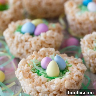 Krispie Easter Nests - This easy Easter dessert is fun to make and eat! Kids love to help decorate with colourful green grass and Easter chocolate and candy.