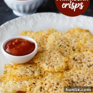 The finished Parmesan crisps ready to be served on a plate.