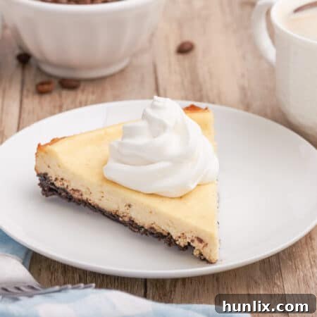 A slice of cappuccino cheesecake on a plate.