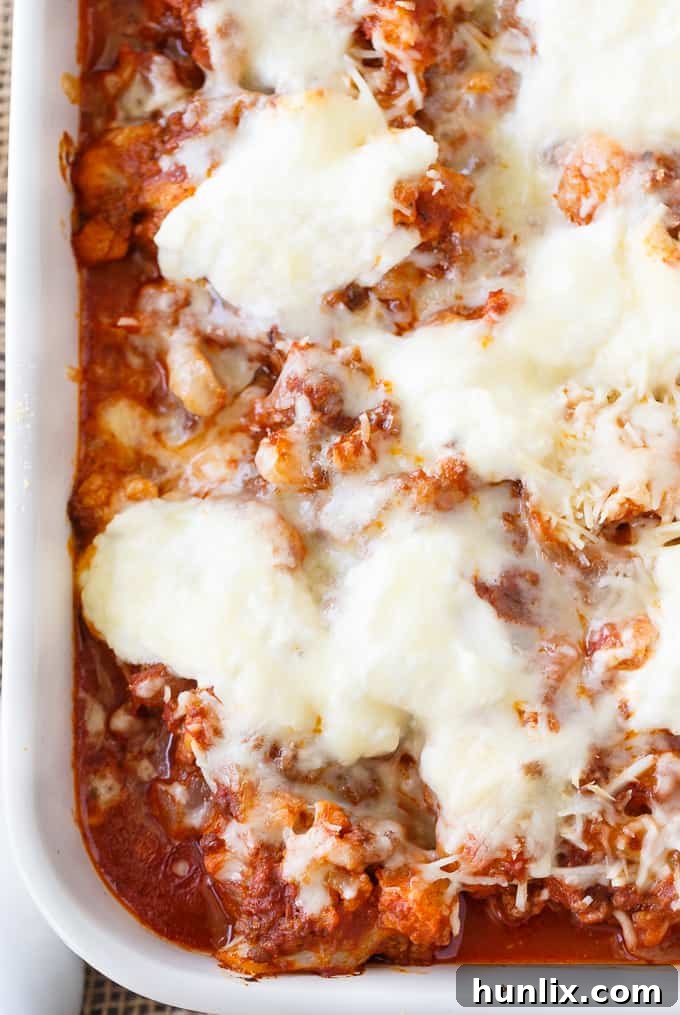 Keto Cauliflower Ziti - Enjoy all the flavours of a hearty Italian meal without the carbs! This keto casserole is meaty and cheesy.