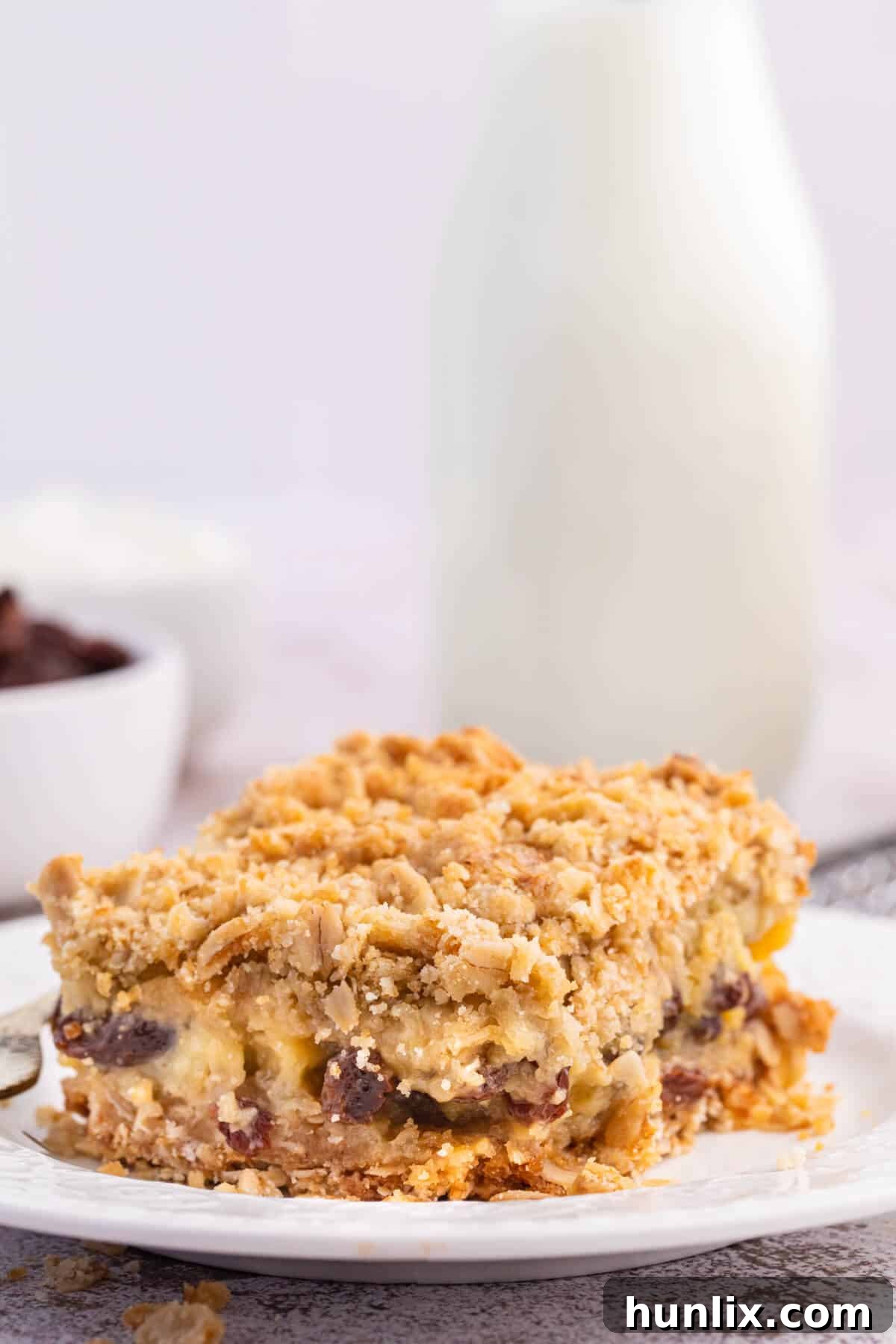 Sweet and Tangy Raisin Bars 5 A sour cream raisin bar on a plate.