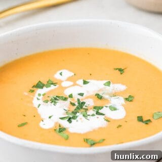 A visually appealing image of the finished Cream of Carrot Soup, inviting readers to try the recipe.
