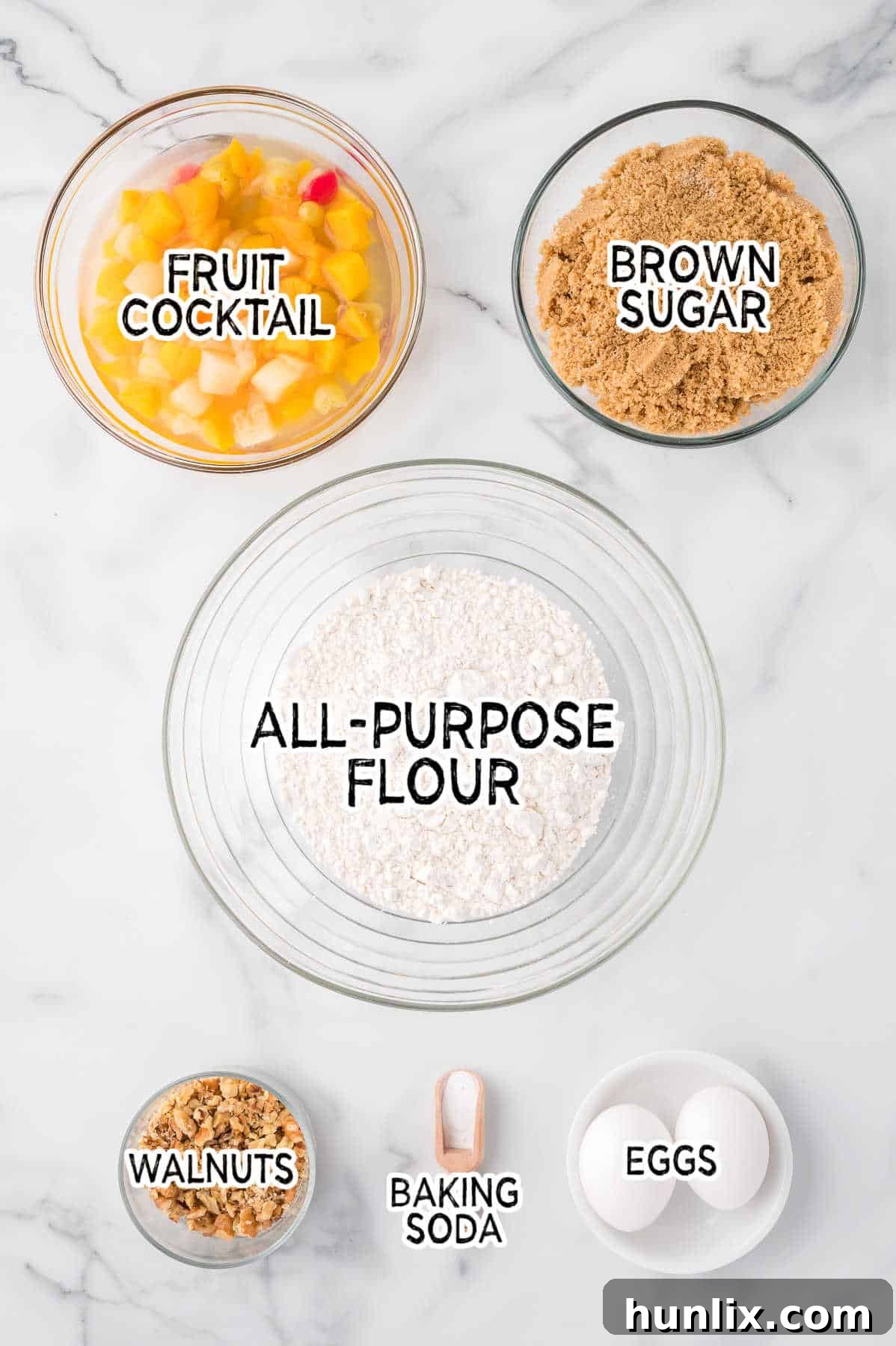 Ingredients on a white marble background.