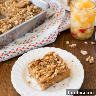 A piece of cake on a white plate.