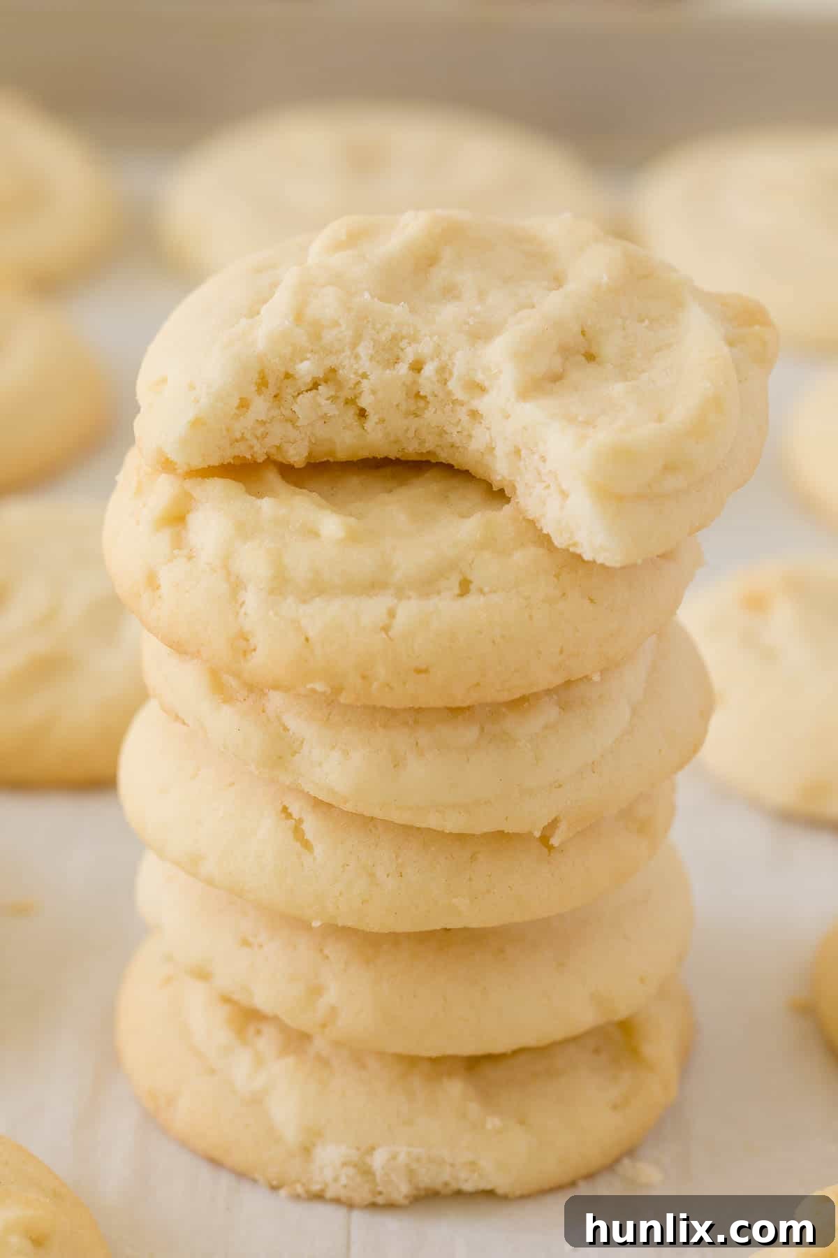 A charming stack of freshly baked whipped shortbread cookies, ready to be enjoyed.