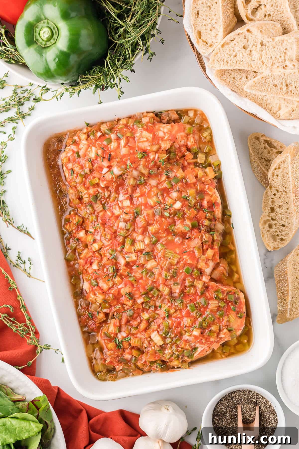 Spanish chicken in a baking pan.