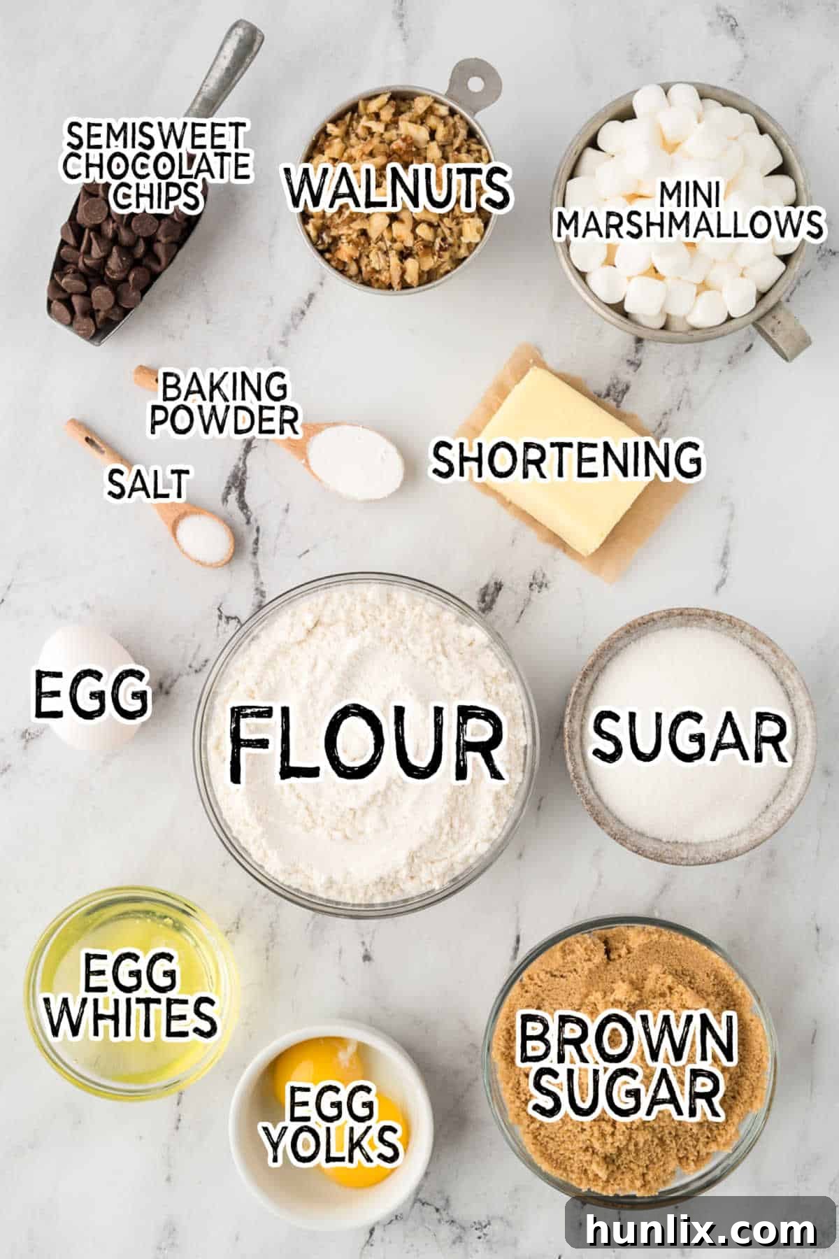 Various ingredients for Mud Hen Bars laid out on a surface.
