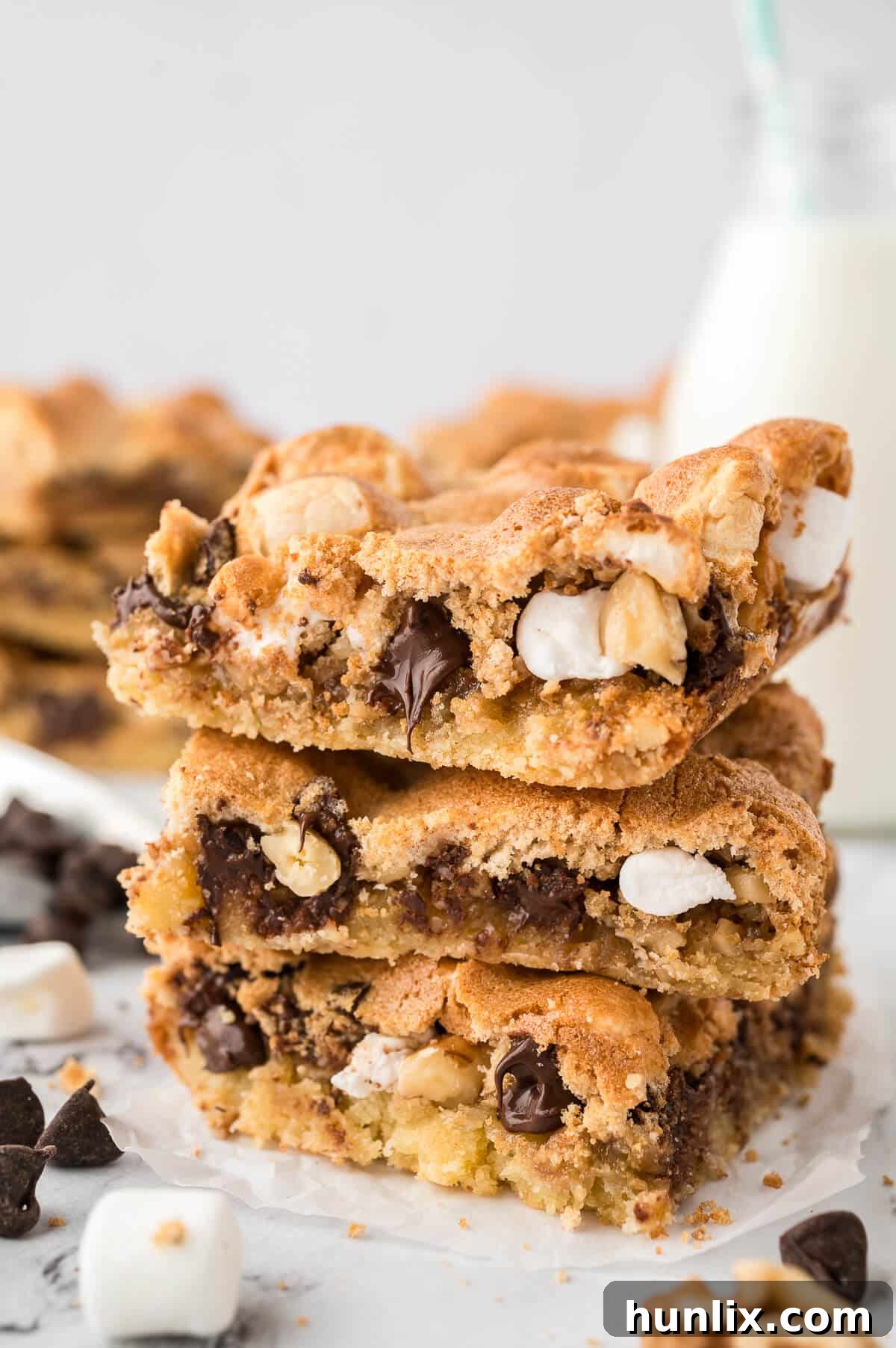 A stack of golden brown Mud Hen Bars, showing their distinct layers.