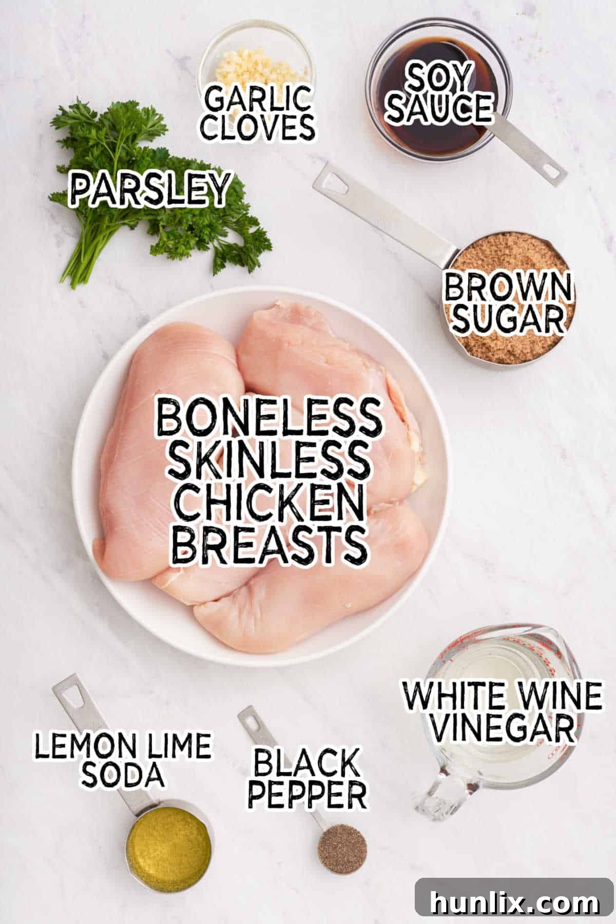 Sticky Sweet Brown Sugar Chicken 3 Ingredients for Brown Sugar Chicken on a white marble background.