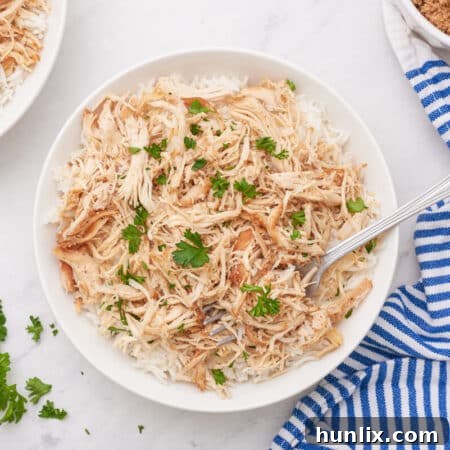 Sticky Sweet Brown Sugar Chicken 8 The recipe in a bowl with a fork.
