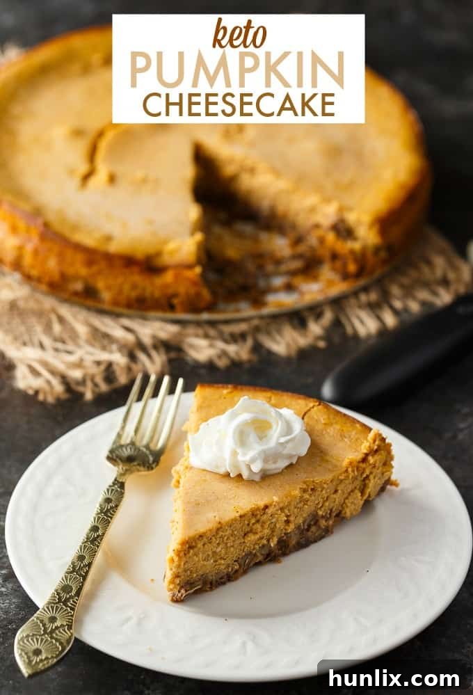 A beautifully decorated Keto Pumpkin Cheesecake, emphasizing its texture and appeal.