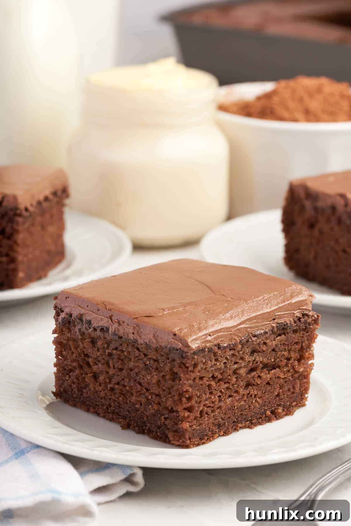 A piece of cake on a plate.