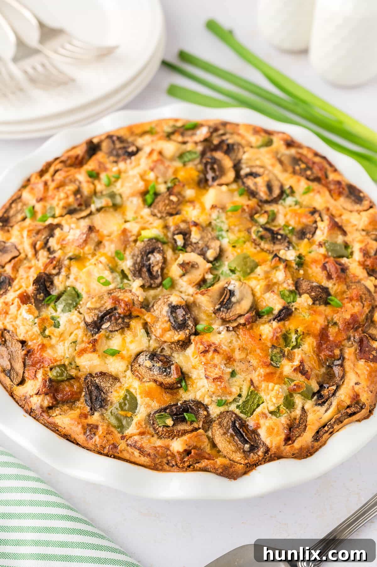 Effortless Chicken Pie 2 Impossible Chicken Pie, golden brown and fresh out of the oven, waiting to be sliced and served.