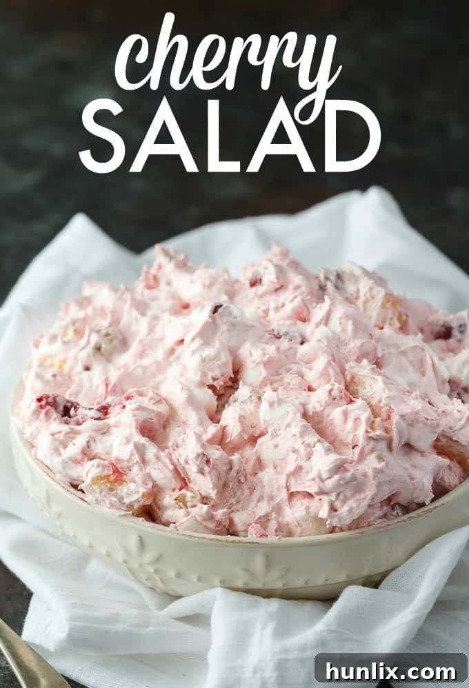 A close-up of the Cherry Salad in a bowl with text overlay.