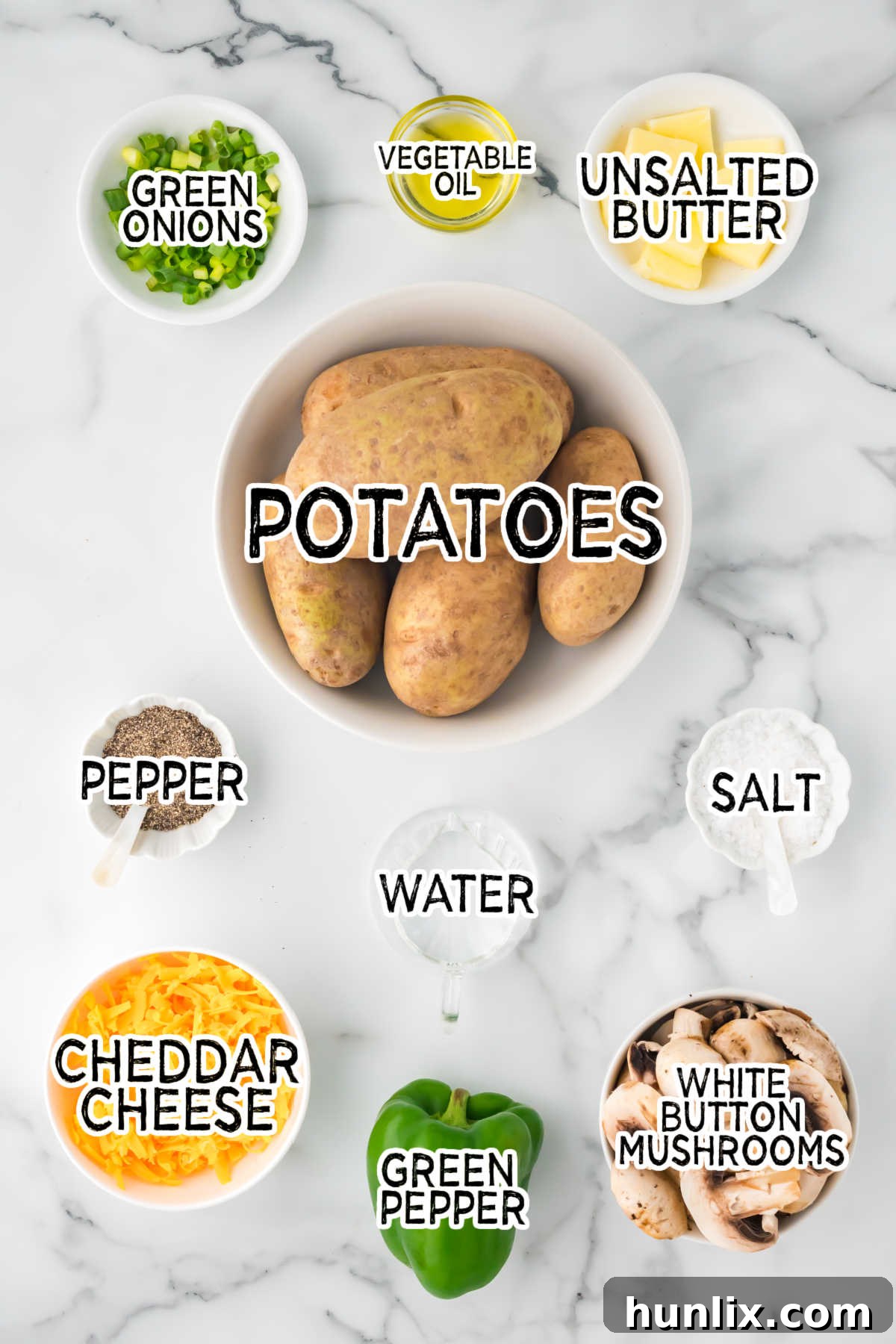 Ingredients on a white marble counter.