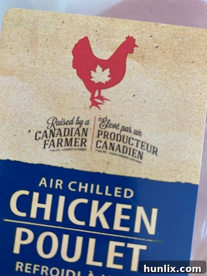 Raised by a Canadian Farmer logo on chicken packaging, signifying high quality and safety standards for Canadian chicken.