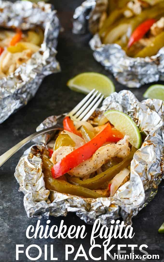 Zesty Chicken Fajita Foil Dinners 6 Multiple Chicken Fajita Foil Packets arranged on a platter with lime wedges, showcasing a complete meal.