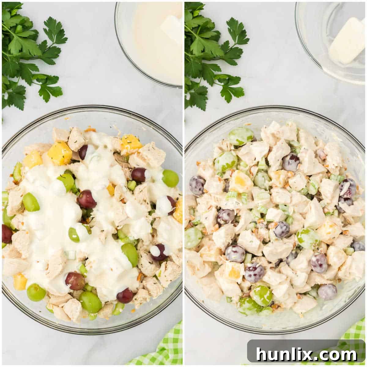 The creamy dressing being folded into the chicken and fruit mixture, ready to create a delicious chicken salad with grapes.
