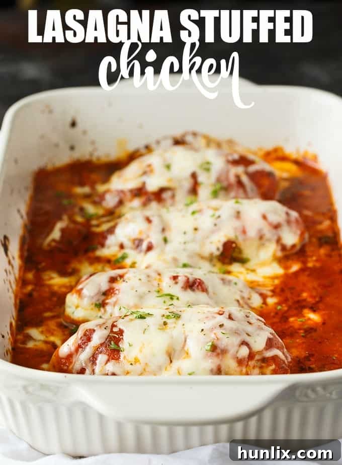 Lasagna Stuffed Chicken - Keto comfort food! Tender chicken breasts are stuffed with a ricotta filling and smothered in marinara sauce and mozzarella cheese.