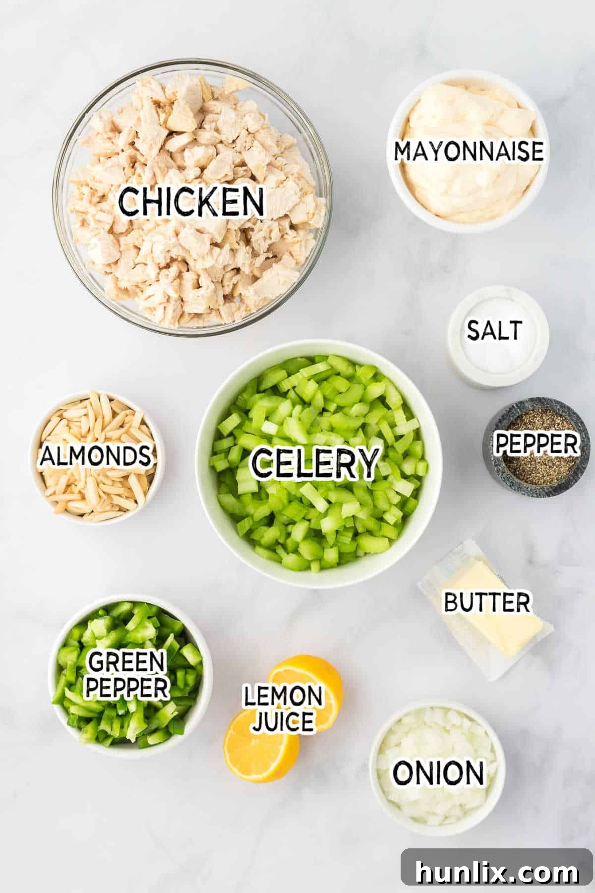 Hearty Chicken Bake 3 Ingredients for hot chicken salad laid out on a marble counter.