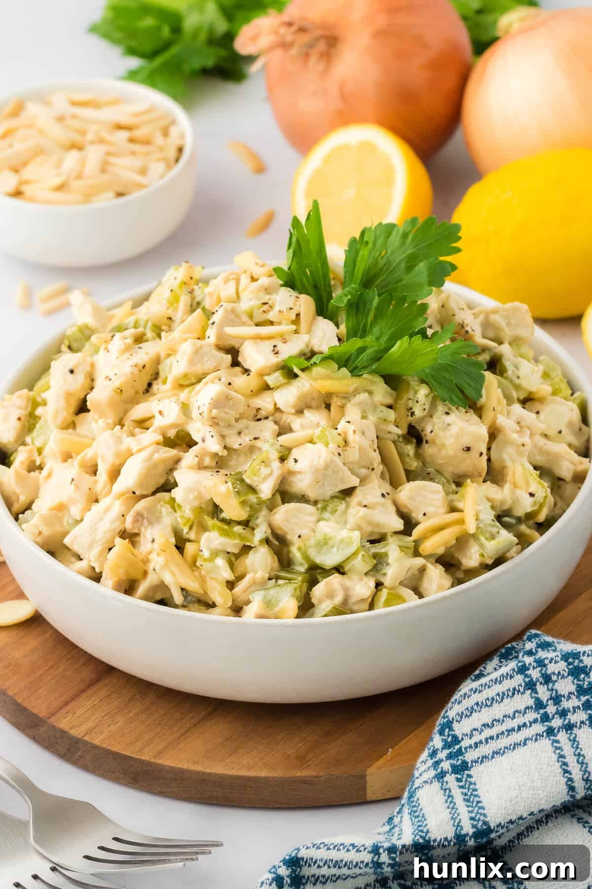 Hearty Chicken Bake 7 The hot chicken salad recipe presented in a white serving bowl.