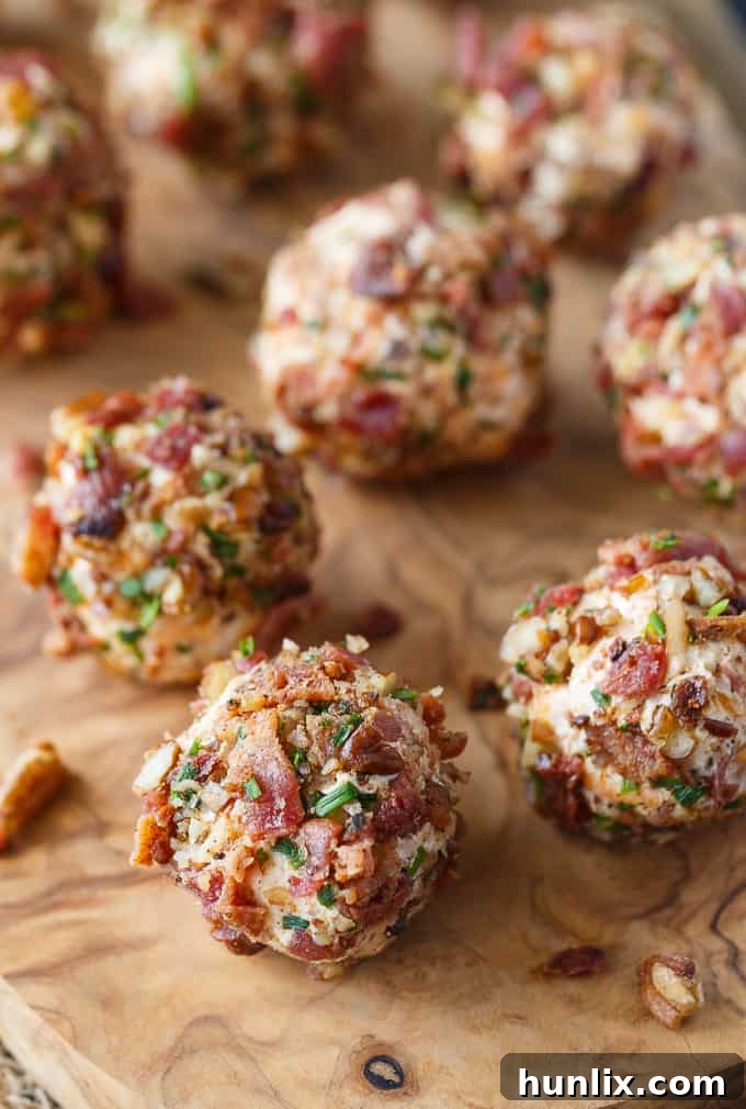 Savory Keto Cheese Bombs 2 Keto Cheese Balls - Bite sized cheese balls make a delicious low carb appetizer! Flavorful cream cheese balls are rolled in a mixture of bacon, chives and pecans.
