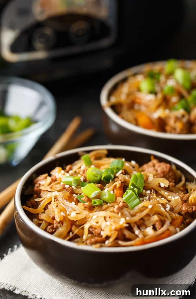 The Crock-Pot 6 Qt. Cook & Carry Programmable Slow Cooker in a kitchen setting, highlighting its design and functionality.