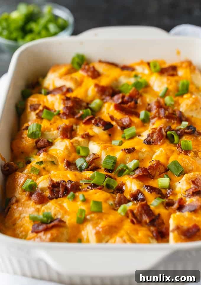 Delicious Bacon and Egg Biscuit Casserole, a perfect make-ahead breakfast for holidays and gatherings.