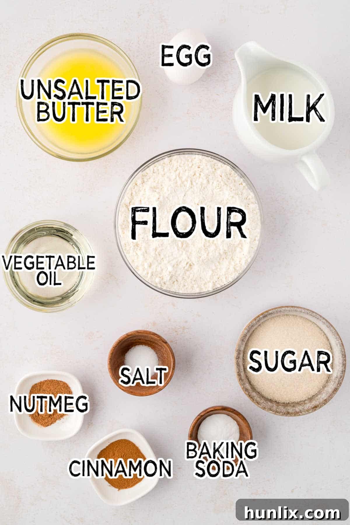 Sweetly Spiced Morning Muffins 3 Organized ingredients for Sugar and Spice Muffins on a wooden surface.