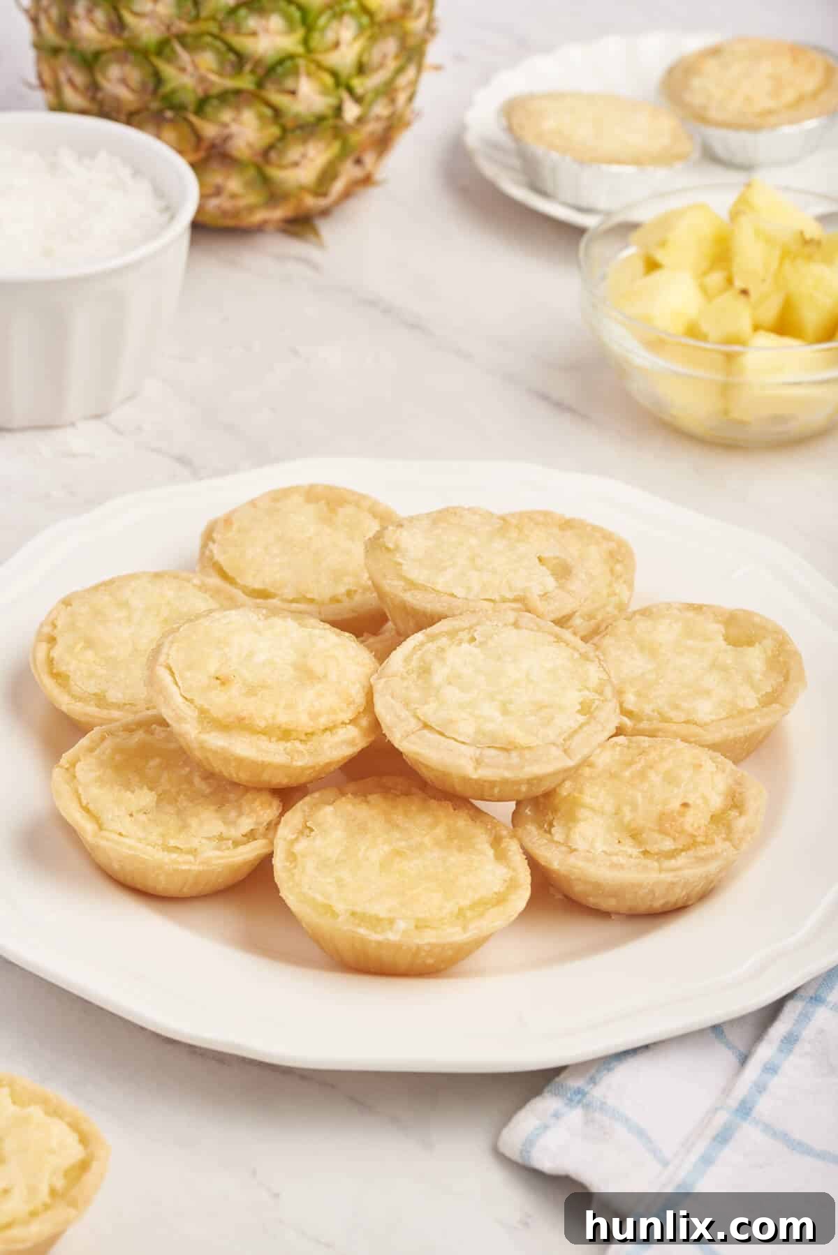 Pineapple tarts on a plate.