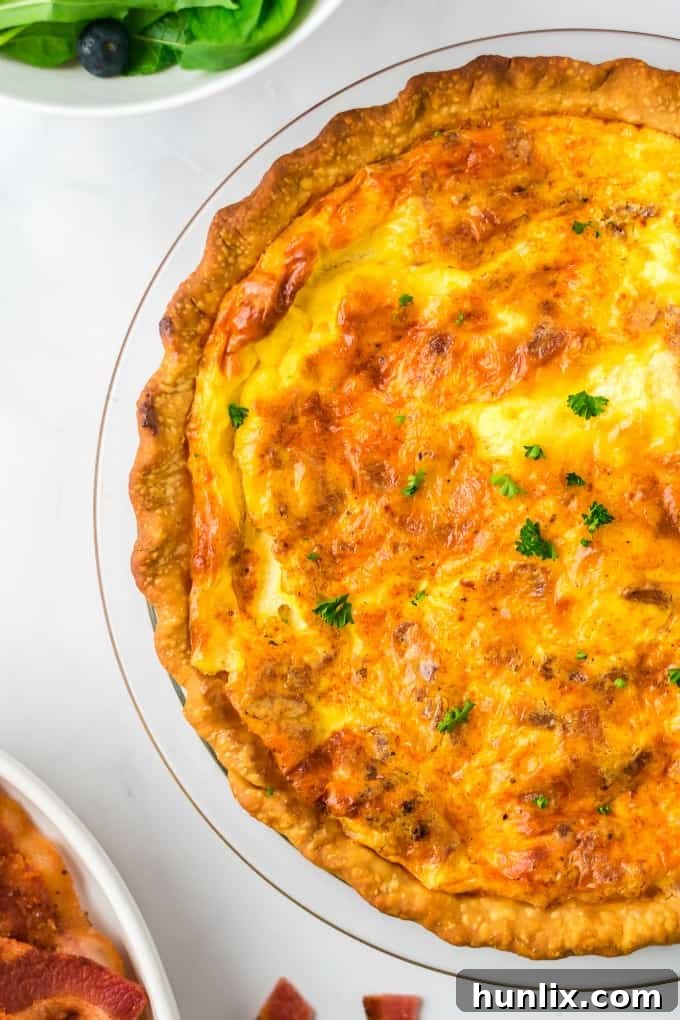A freshly baked Quiche Lorraine, golden brown and perfectly set
