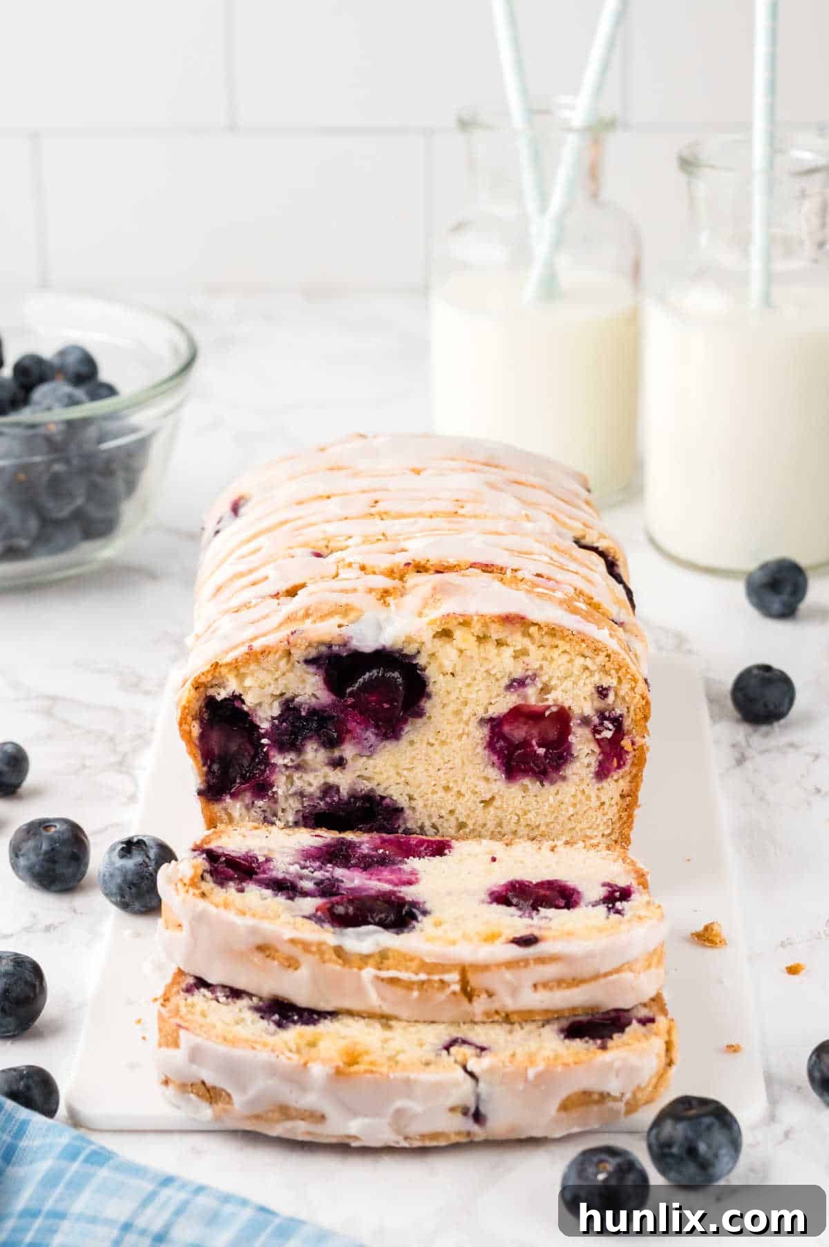 Blueberry Burst Loaf 2 Blueberry Bread with slices cut off the end.