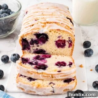 Blueberry Burst Loaf 11 Bread with slices cut off the end.