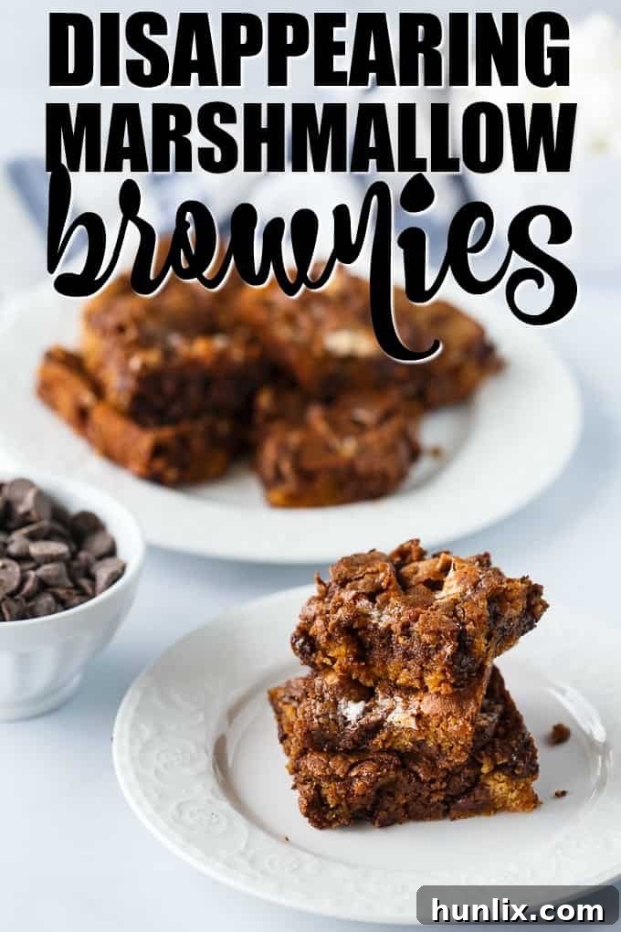 Molten Marshmallow Brownie Bliss 2 Disappearing Marshmallow Brownies - A sweet church cookbook brownie recipe filled with chocolate, butterscotch and marshmallows. Each bite is pure decadence.