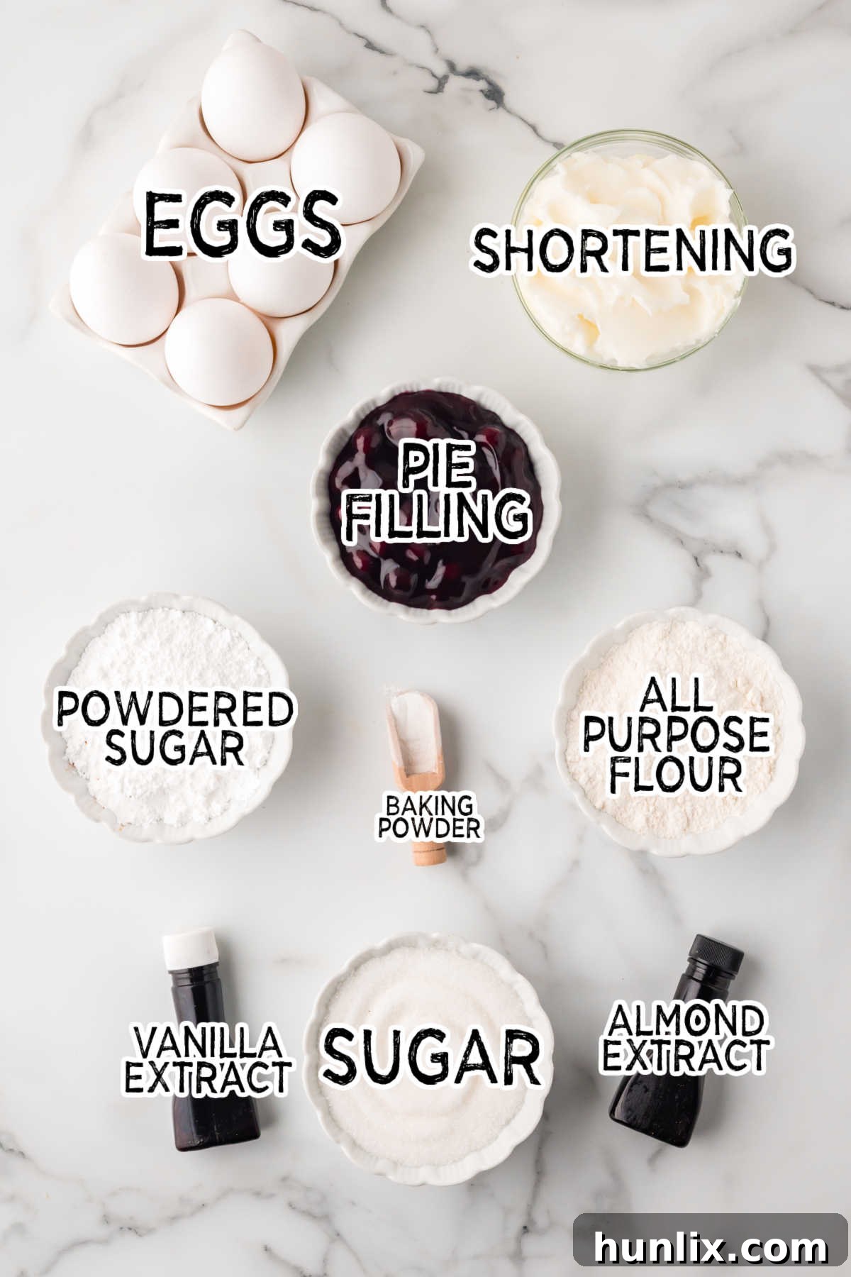 Ingredients on a white marble counter.