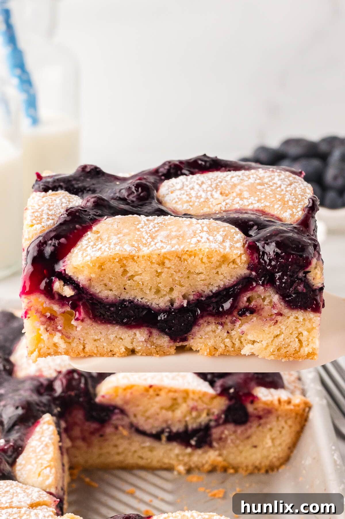 A slice of cake on a spatula.