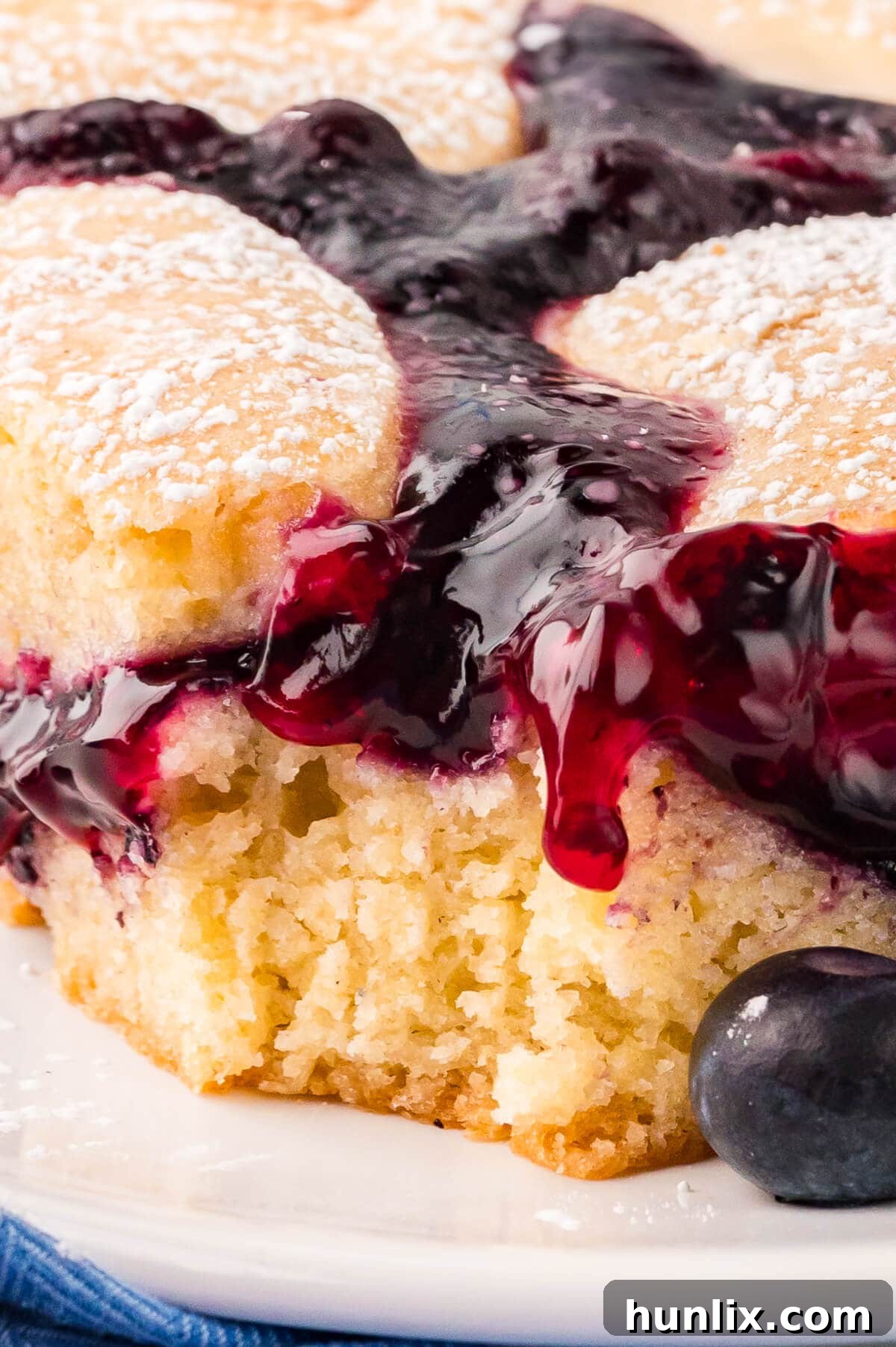 Close up of a piece of cake with a bite out of it.