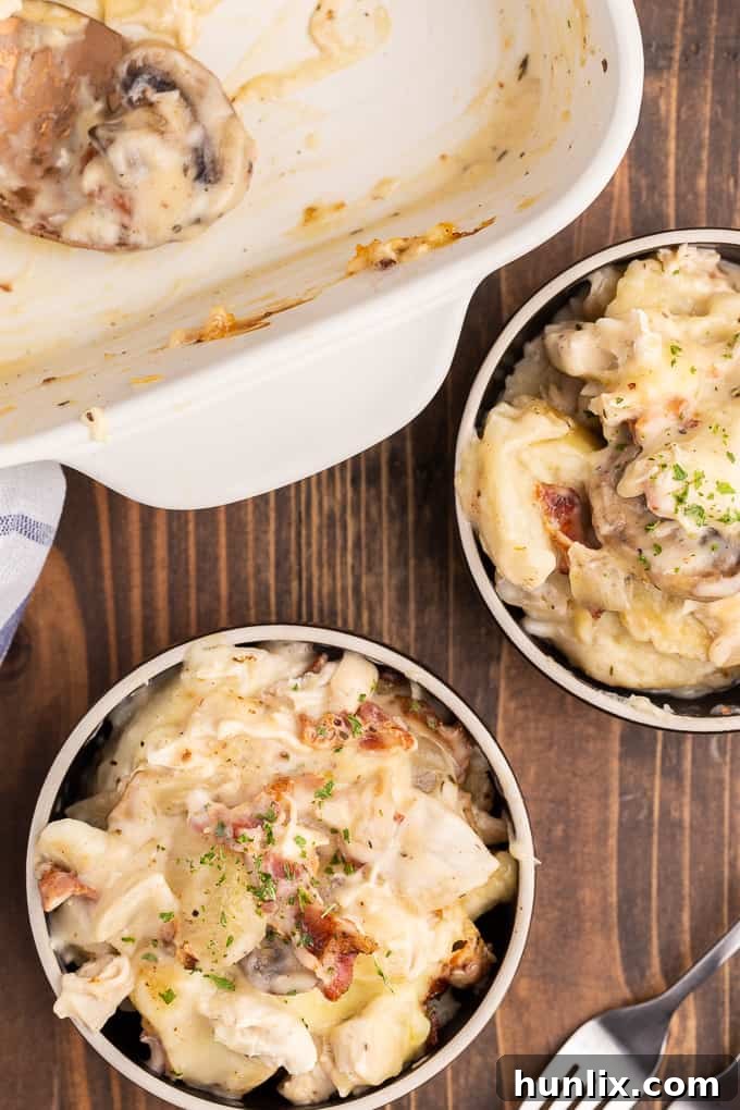 Creamy Chicken Pierogi Bake 8 A warm, inviting full shot of the baked Chicken Alfredo Pierogi Casserole, ready to be served, capturing its rich texture and appetizing appeal.