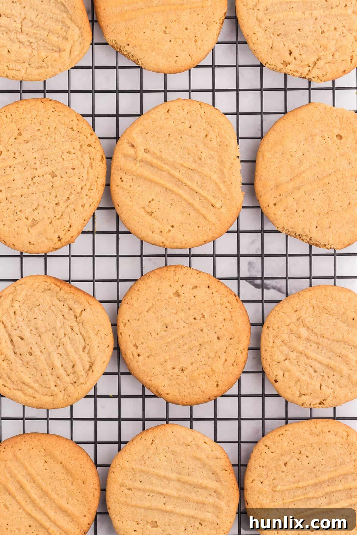 Peanut Butter Cookies - This classic homemade cookie recipe is quick and easy to make. Each bite is soft, chewy and full of peanut butter flavor that everyone knows and loves.