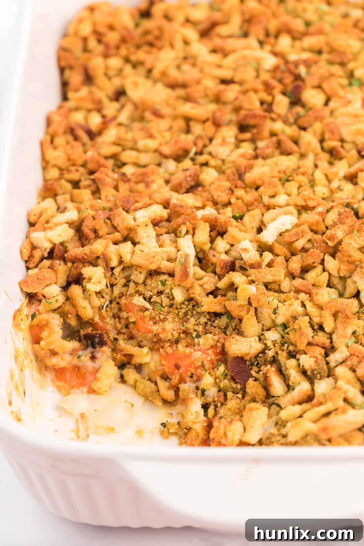 Sweet Carrot Bake 2 Carrot Casserole - A comforting vegetable side dish that is creamy, cheesy, and topped with buttery stuffing. Kid-friendly and perfect for encouraging vegetable consumption.