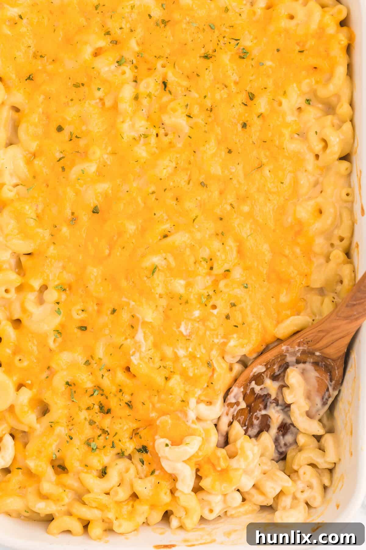 Golden-Crusted Mac and Cheese 7 Baked Macaroni and Cheese - This old-fashioned classic recipe is a family favorite dinner and so easy to make. Tender elbow macaroni noodles are enveloped in an ultra creamy homemade cheese sauce and covered with melted cheddar cheese.