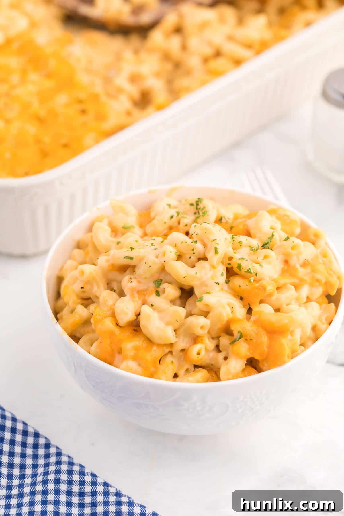 Golden-Crusted Mac and Cheese 10 Baked Macaroni and Cheese - This old-fashioned classic recipe is a family favorite dinner and so easy to make. Tender elbow macaroni noodles are enveloped in an ultra creamy homemade cheese sauce and covered with melted cheddar cheese.