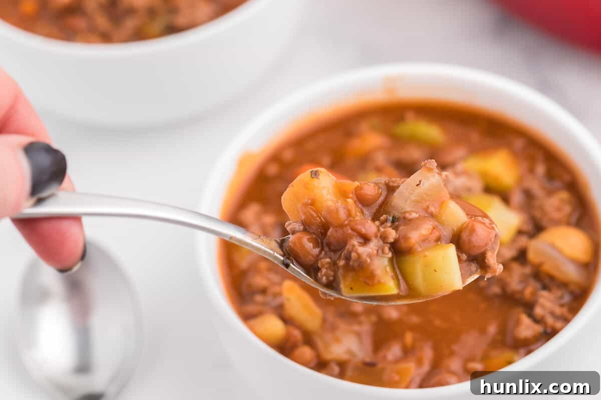 Hodge Podge Soup - A hearty soup recipe like grandma used to make. It's a clean out your kitchen kind of meal with two cans of soup, pork and beans, ground beef and celery. Perfect for busy days!
