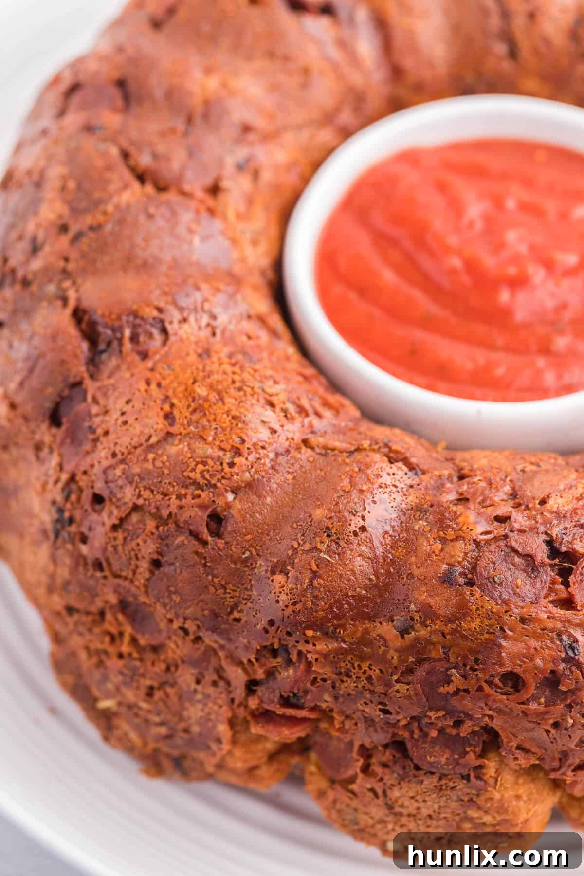 Close-up of Pizza Monkey Bread showing the cheesy, pepperoni-filled pieces