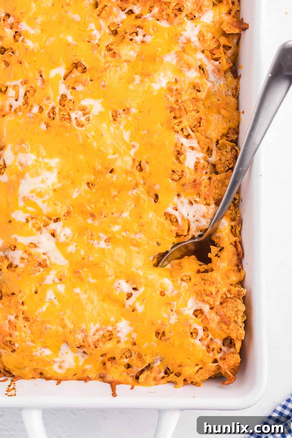 Loaded Doritos Casserole 9 Doritos Casserole Recipe - Take Mexican night to a whole new level with this easy taco bake recipe. Made with ground beef, sour cream, spices and loads of cheese, it's zesty with hearty Tex Mex flavor. A yummy dinner recipe your family will love!
