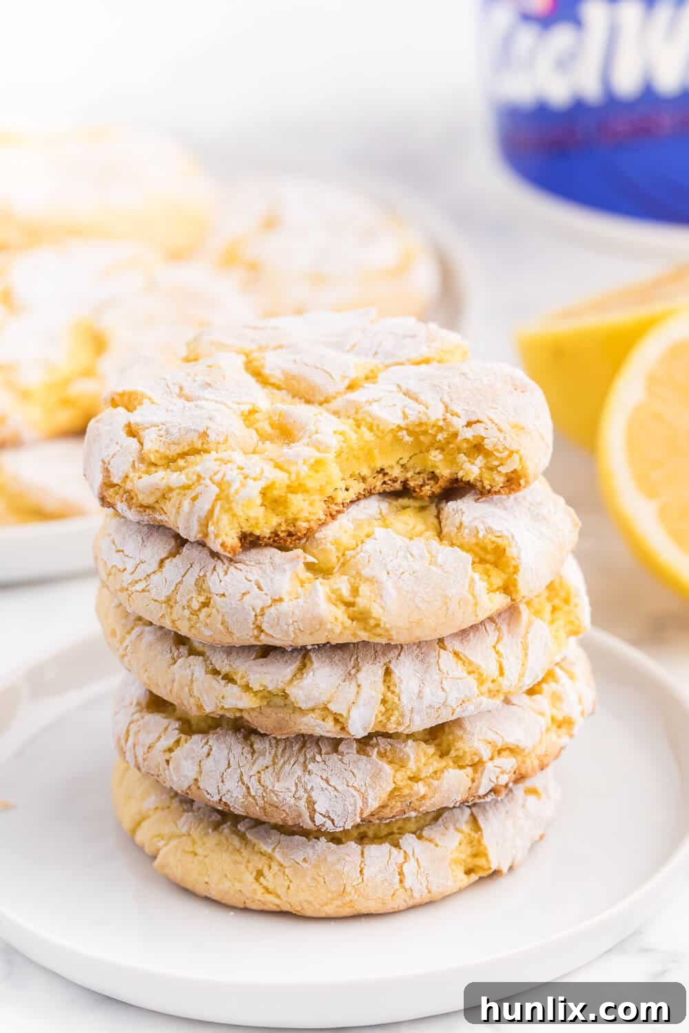 A beautifully arranged serving of Cool Whip Cookies on a rustic wooden board, garnished with fresh fruit, inviting to be enjoyed.