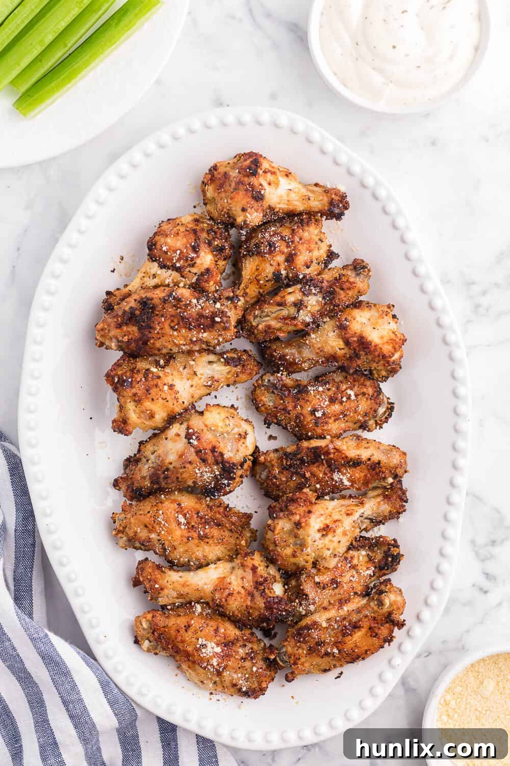 Air Fryer Chicken Wing on a white platter.