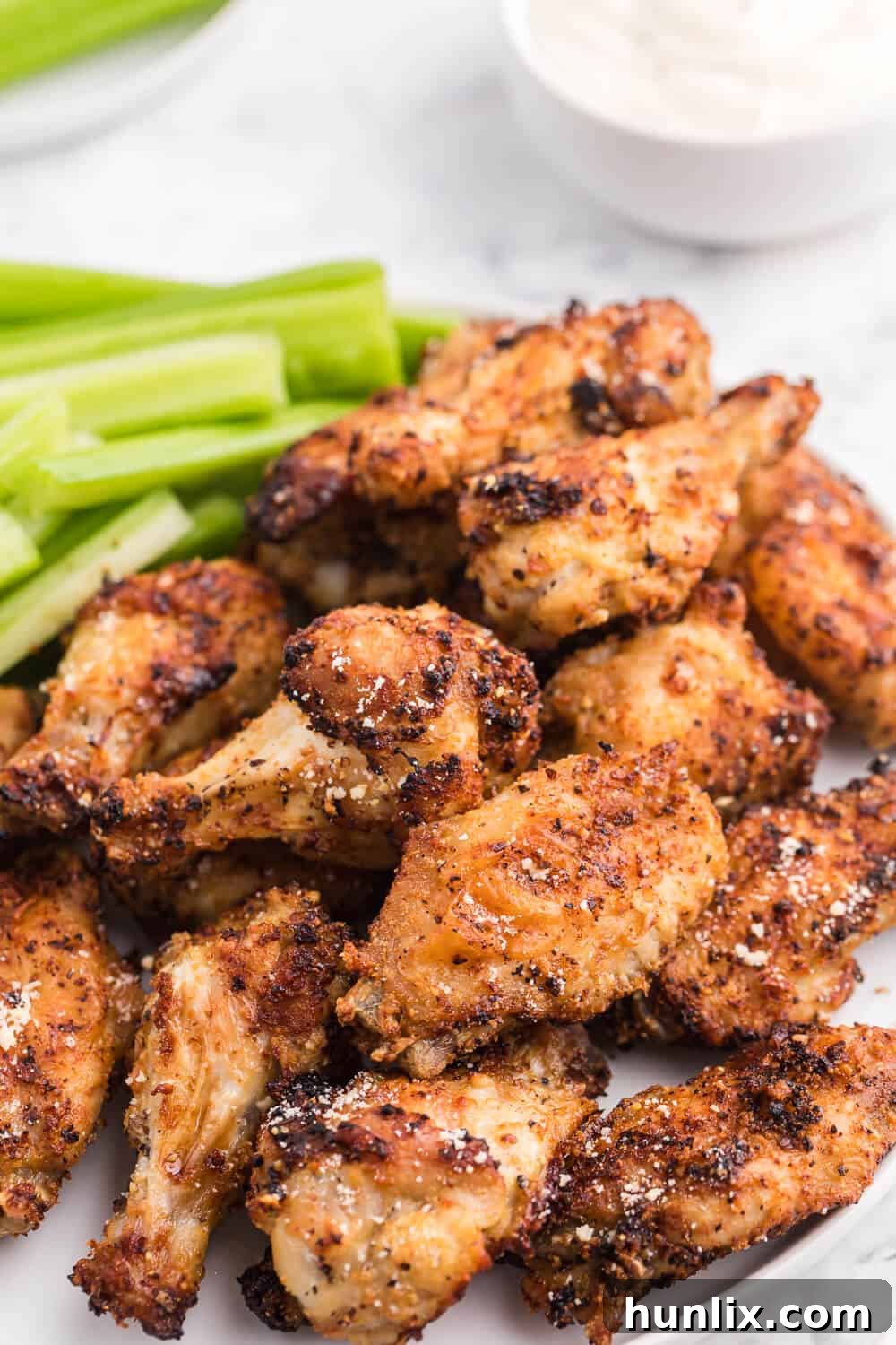 The recipe on a plate with celery sticks.